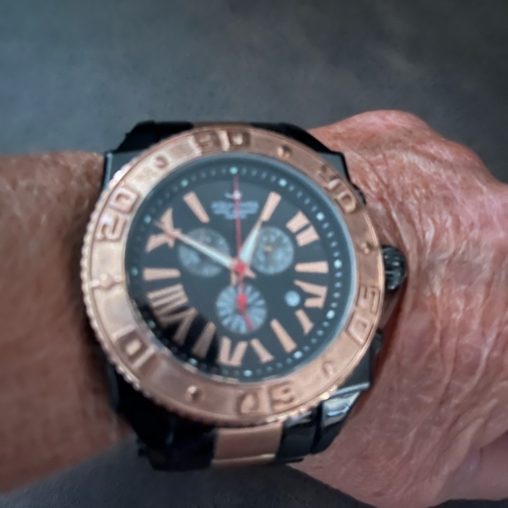 Aquaswiss Black and Gold Watch with Bold Design